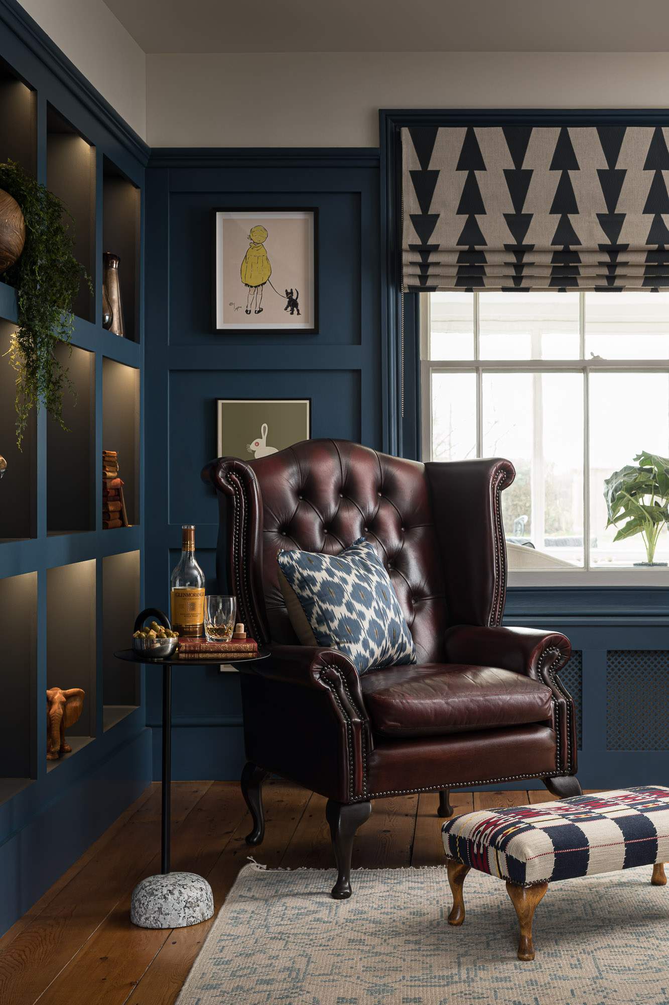 Newly panelled snug with vintage wingback leather armchair