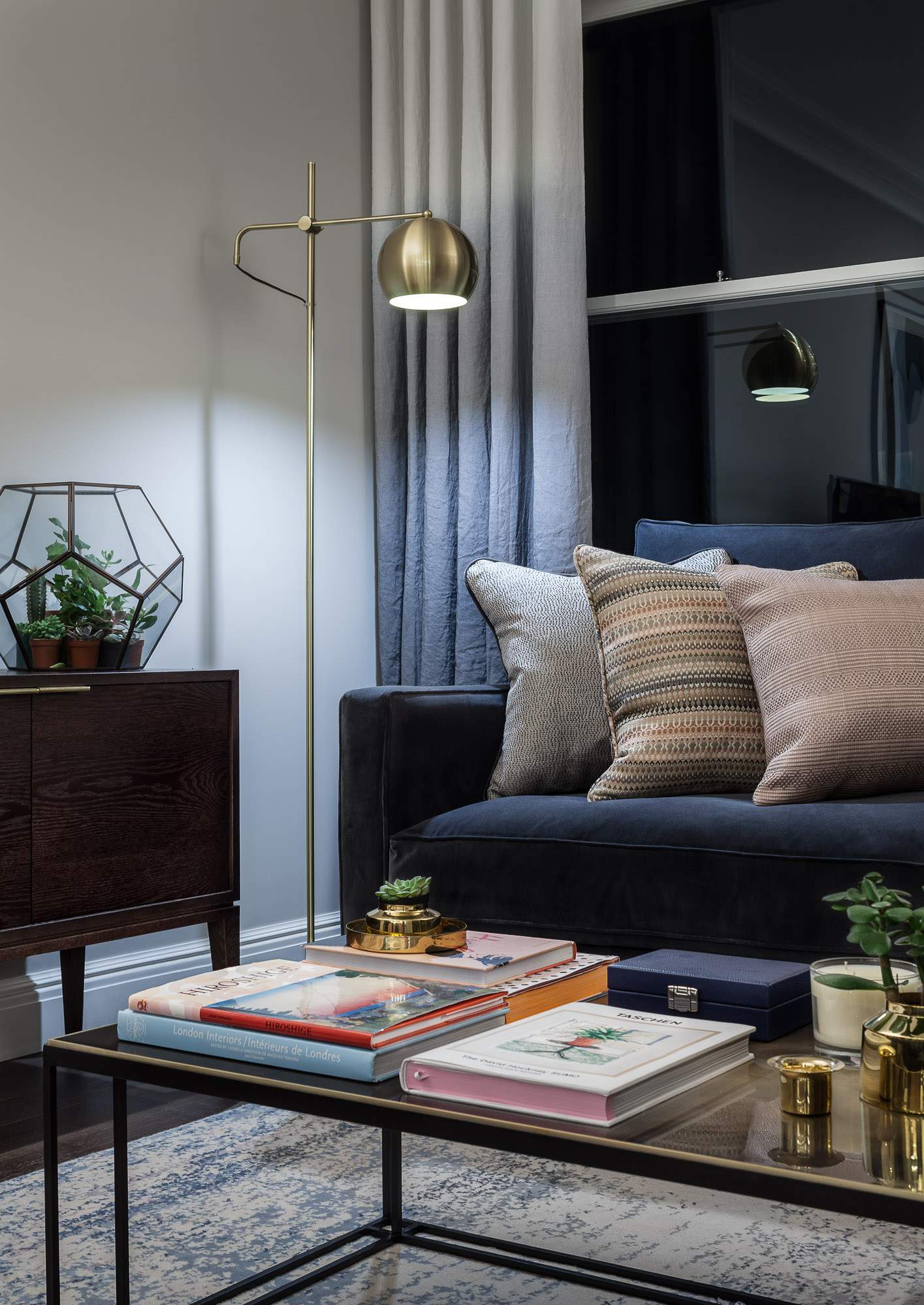 Living Room Ombre curtains, dark grey velvet sofa with brass Novocastrian coffee table